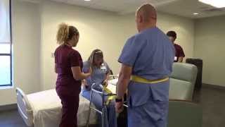 Physical Therapy Transfer Training  How To Transfer From Wheelchair To Bed [upl. by Aikrehs]